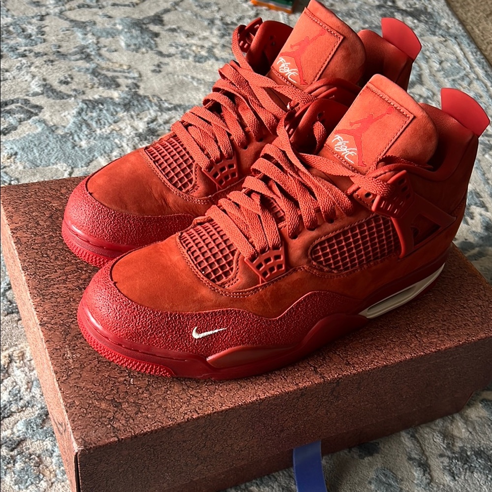 Jordan (Bike Air) Bricks Red Sneakers Air Jordan 4 Striking Design